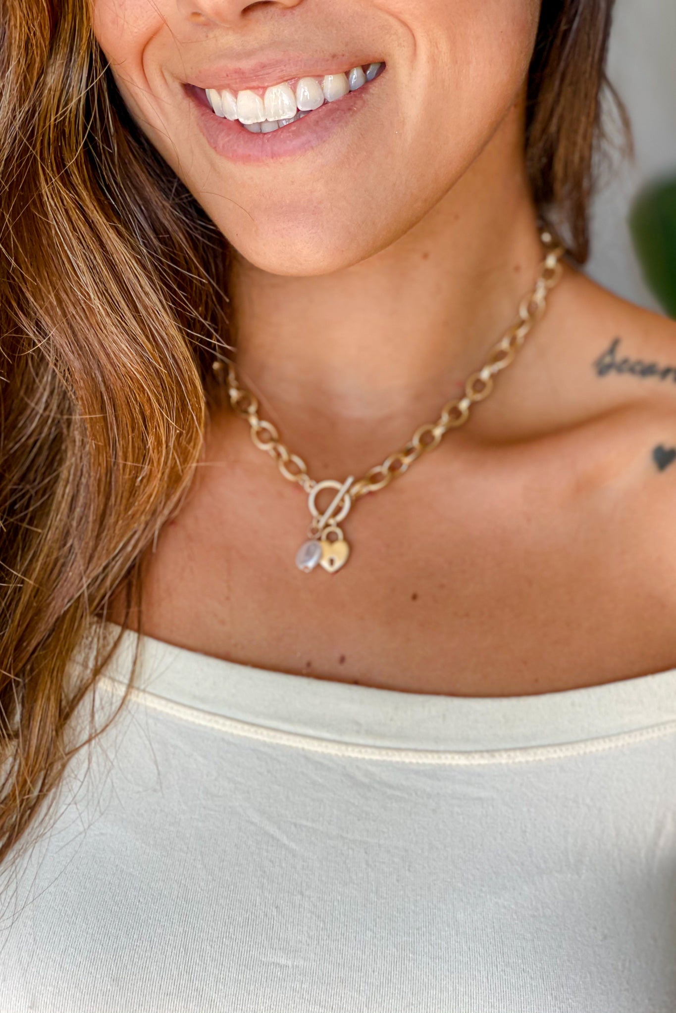 Charming Gold Layered Chain Necklace with Heart Lock Design