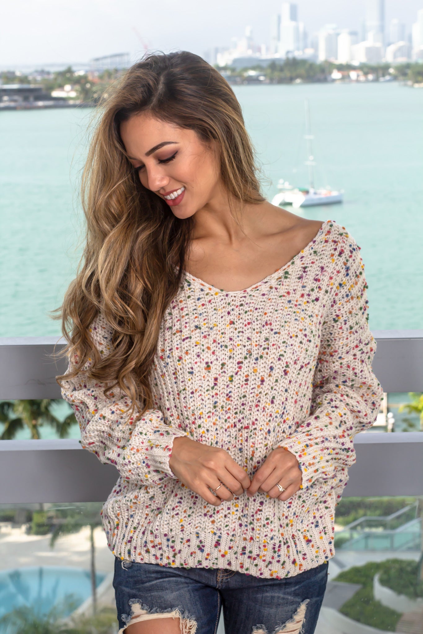 Stylish Ivory Multi - Colored Knit Sweater with Back Twist Design