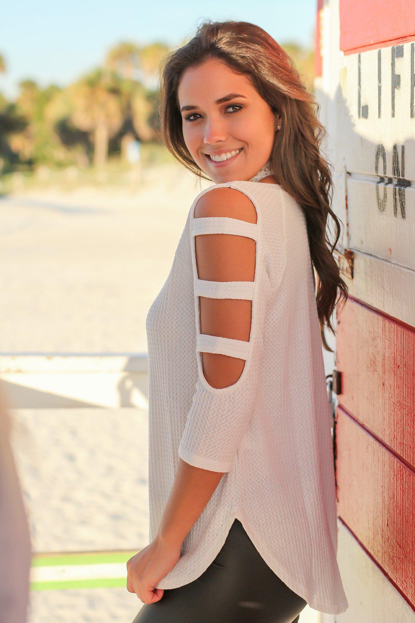 Adorable Ivory Knit Women's Top with Unique Cut-Out Sleeve Design