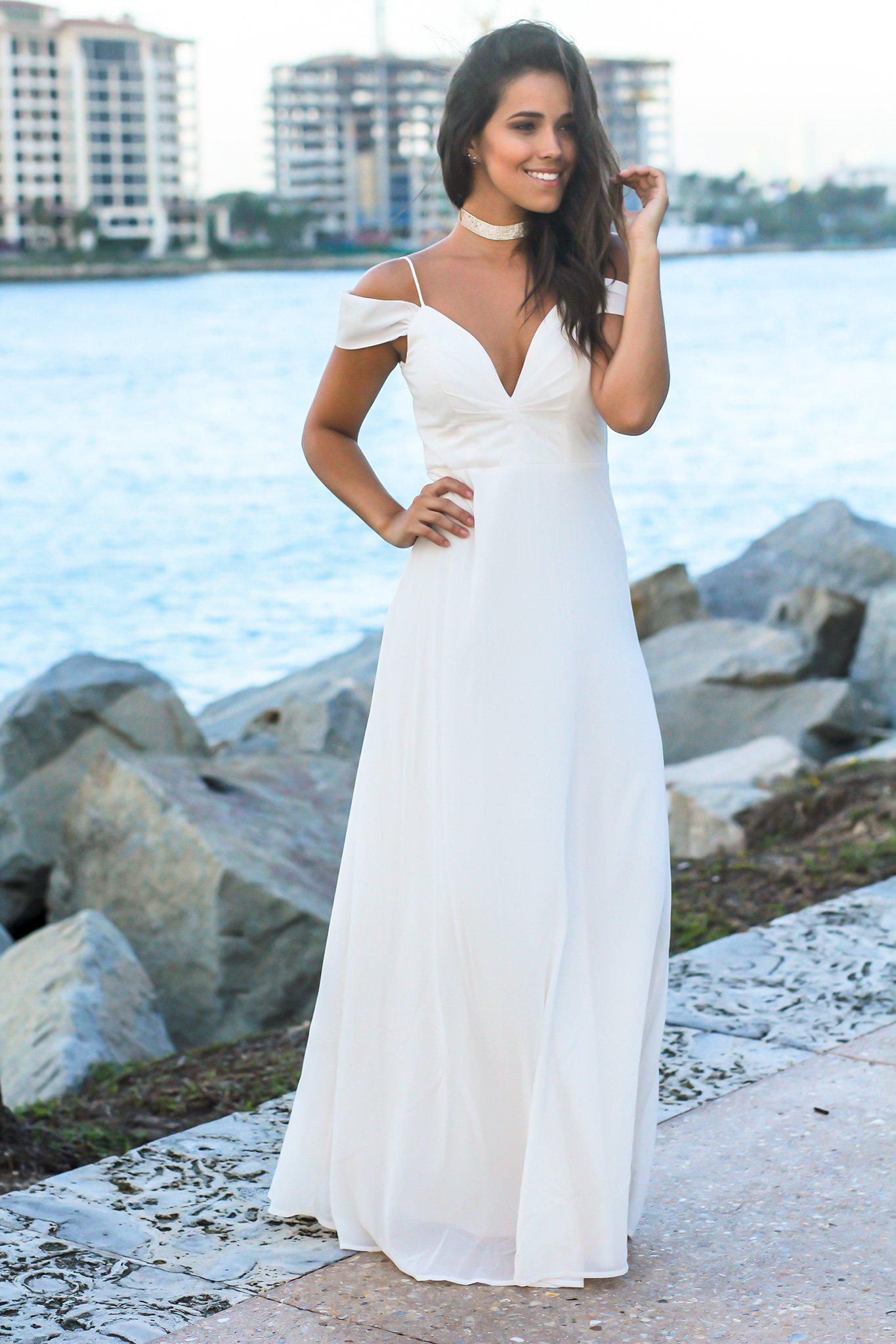 Elegant Ivory Off-Shoulder Maxi Dress with Stylish Tie-Back Design