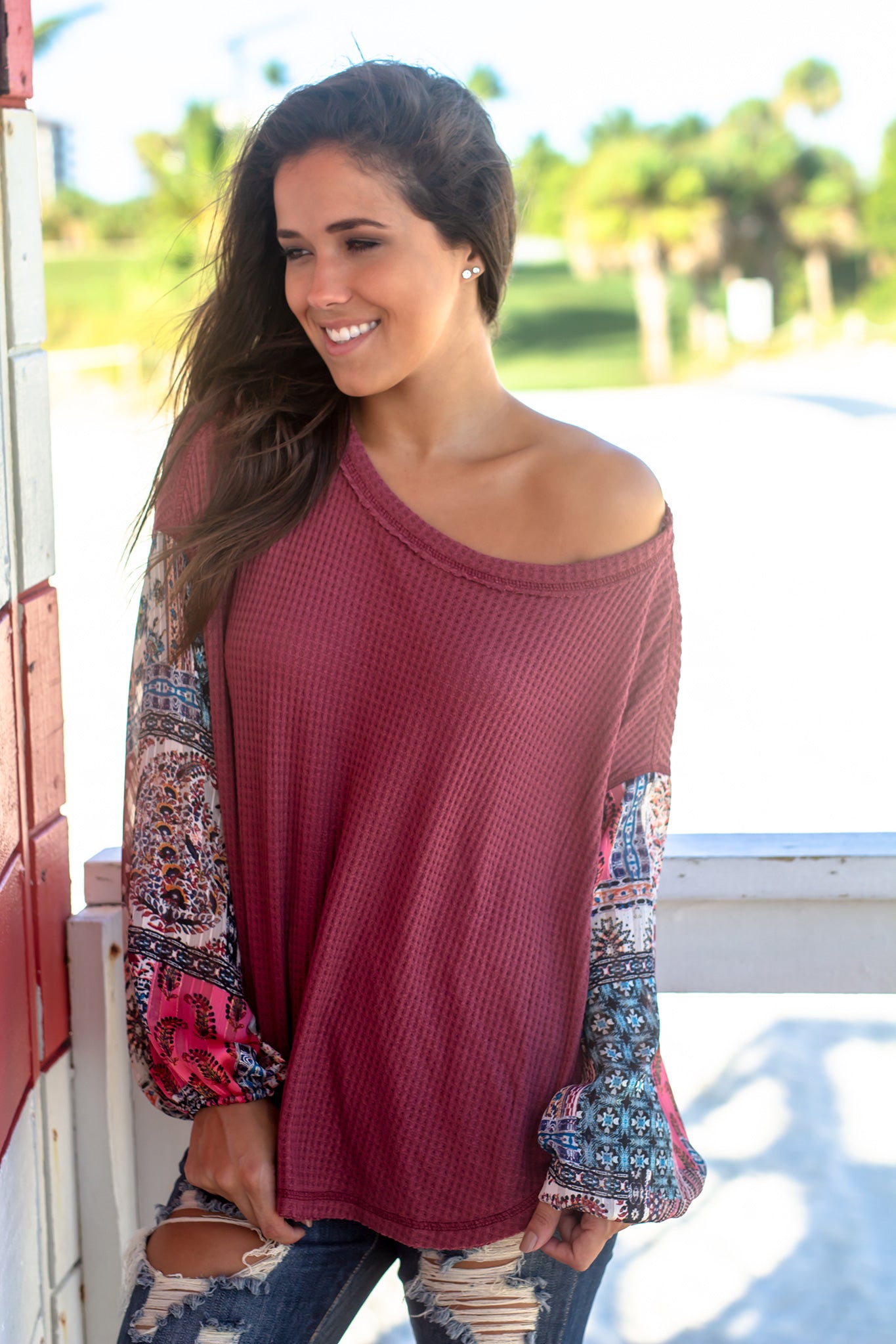 Stylish Women's Burgundy Knit Top Featuring Printed Long Sleeves
