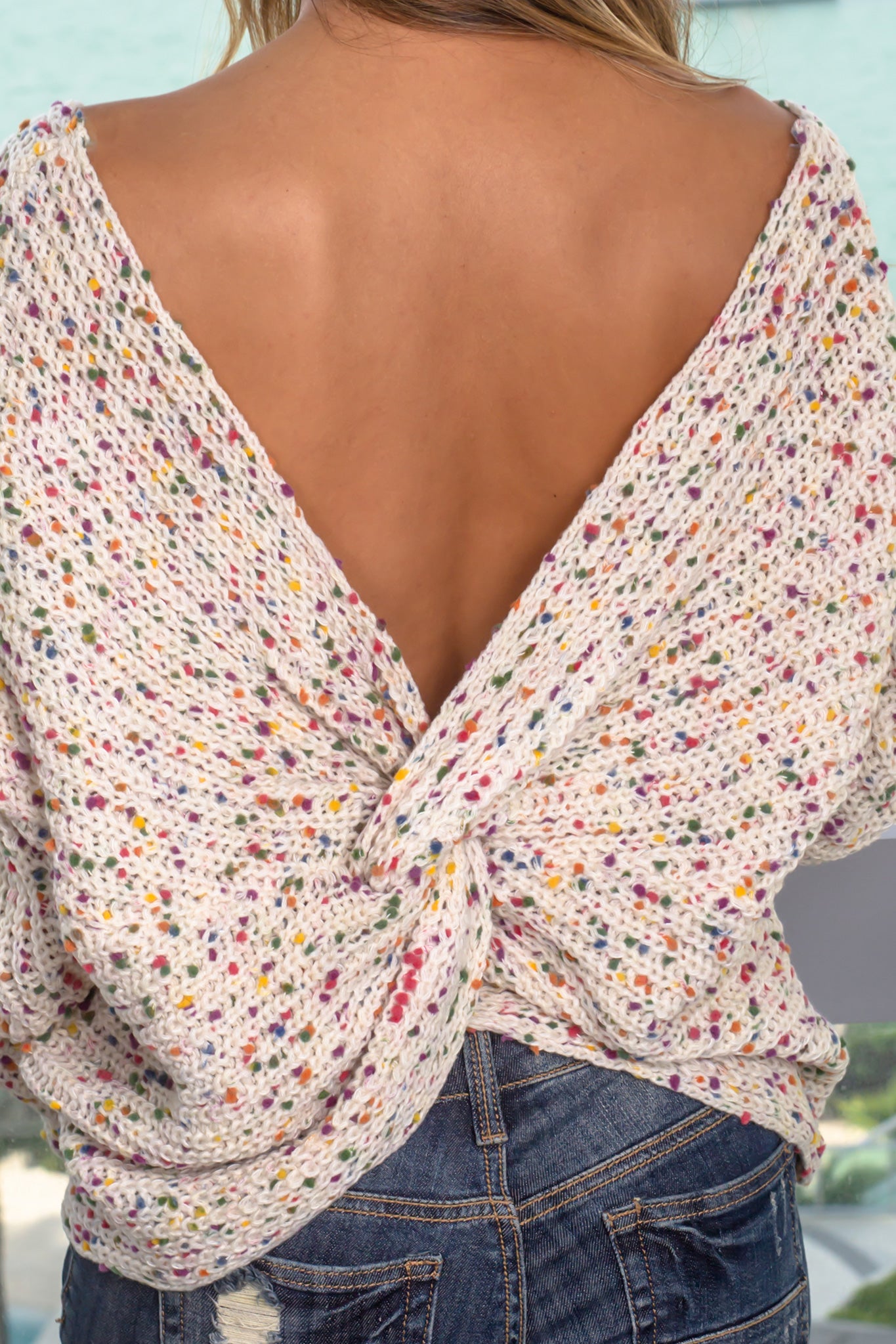Stylish Ivory Multi - Colored Knit Sweater with Back Twist Design