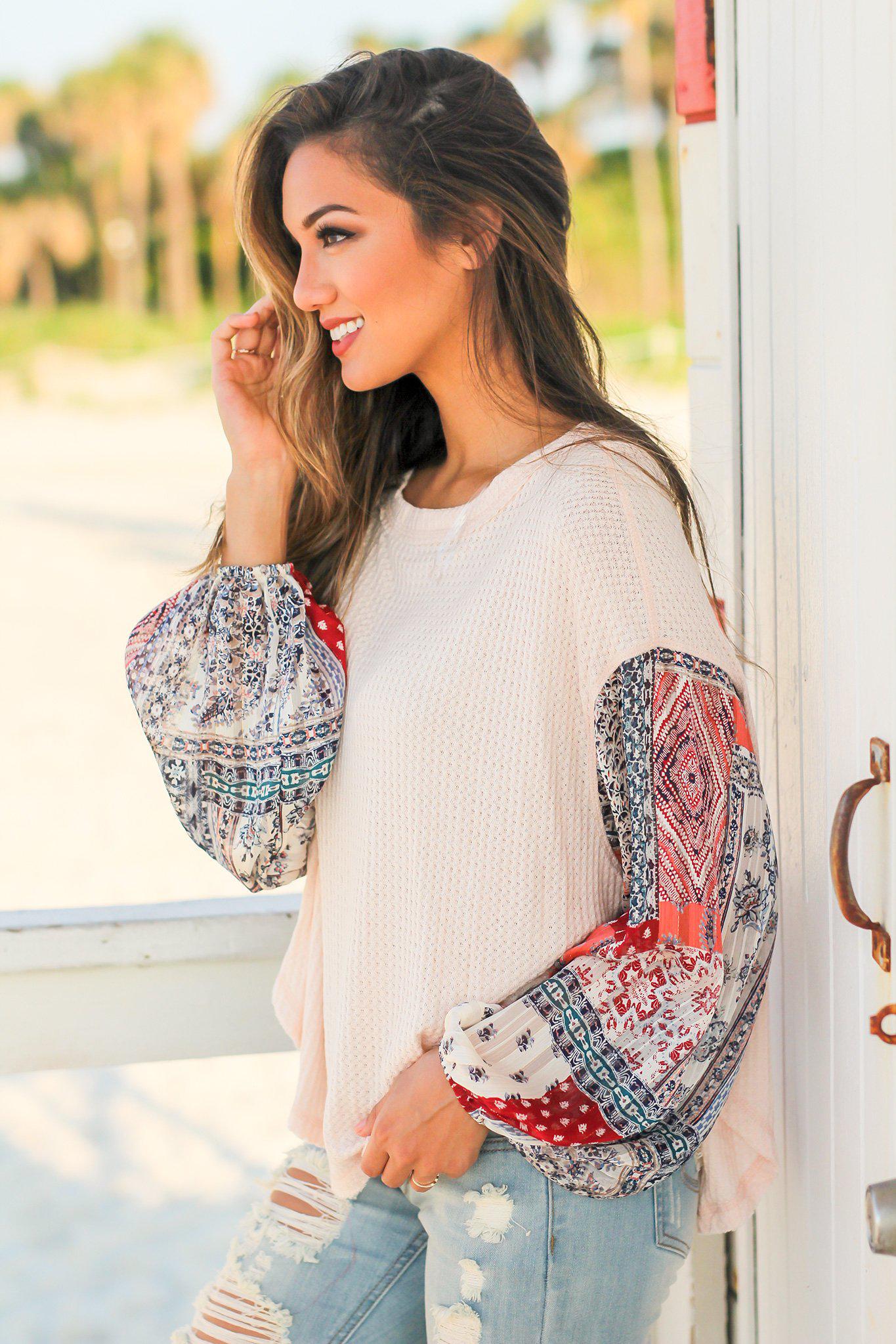 Stylish Light Peach Colored Knit Women's Top Featuring Printed Long Sleeves