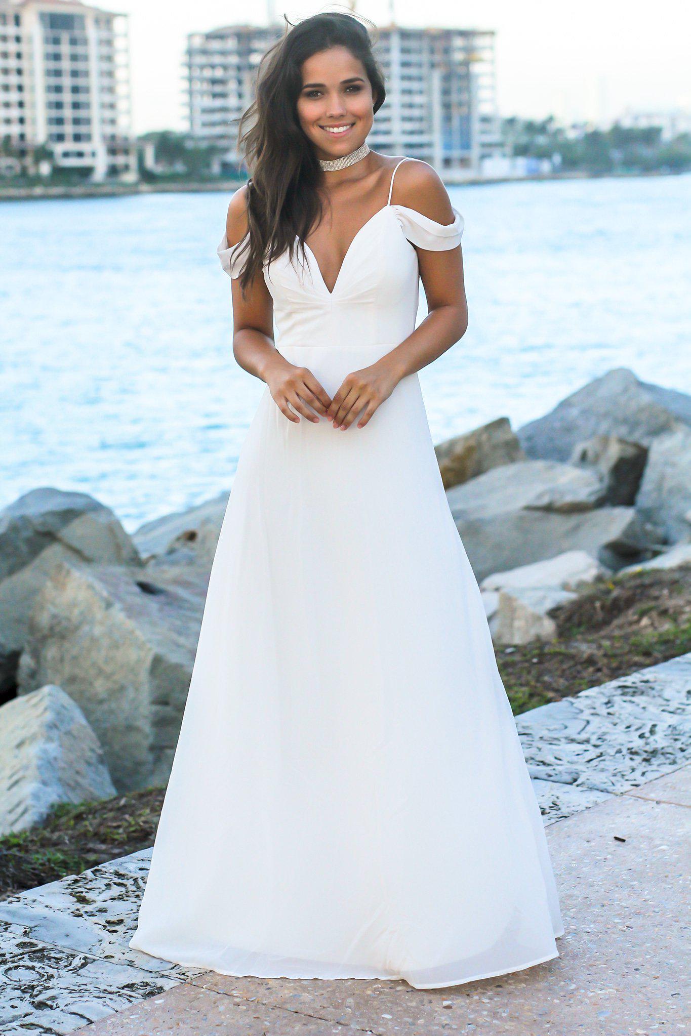 Elegant Ivory Off-Shoulder Maxi Dress with Stylish Tie-Back Design