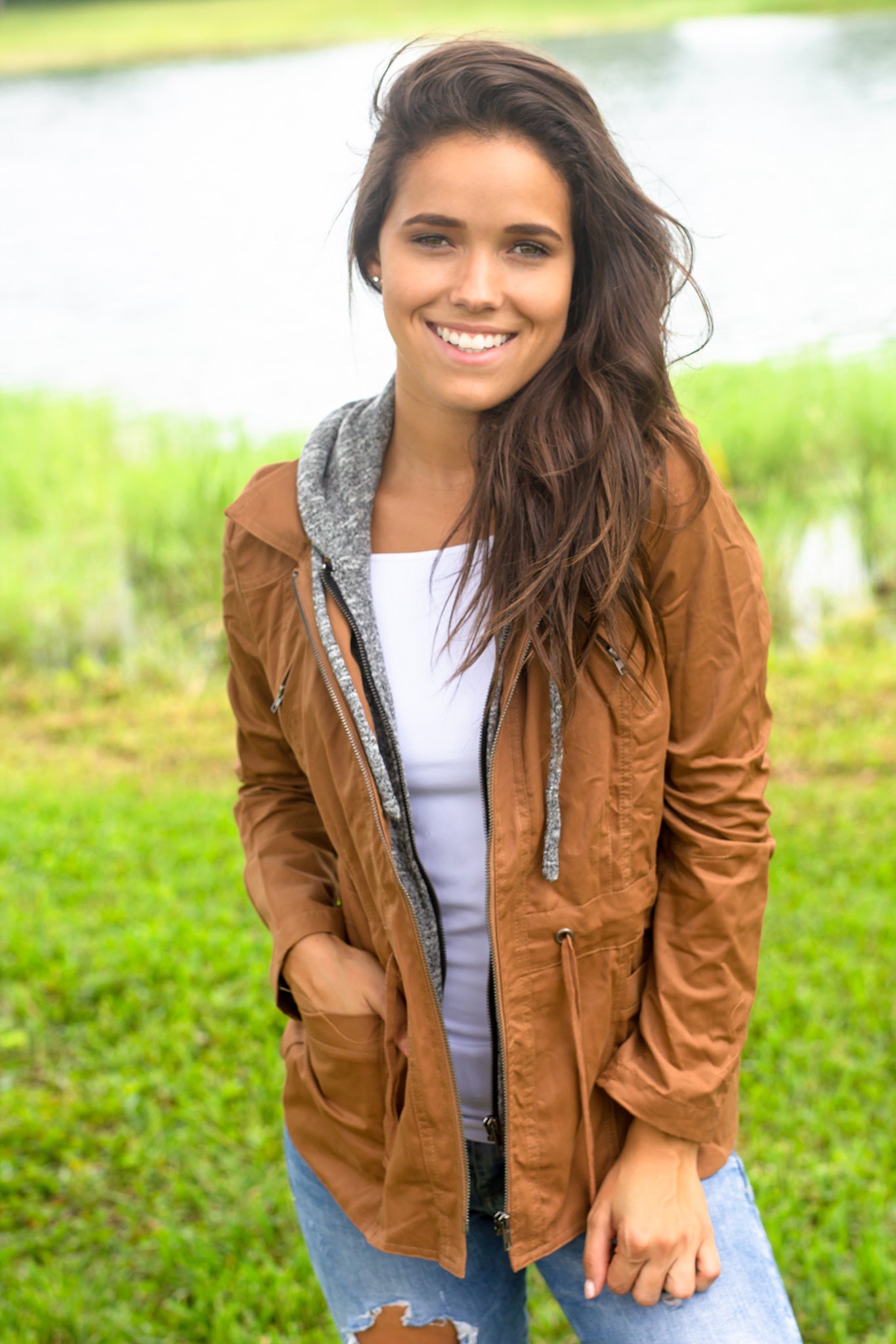 Stylish Camel Jacket with Gray Hood and Functional Pockets