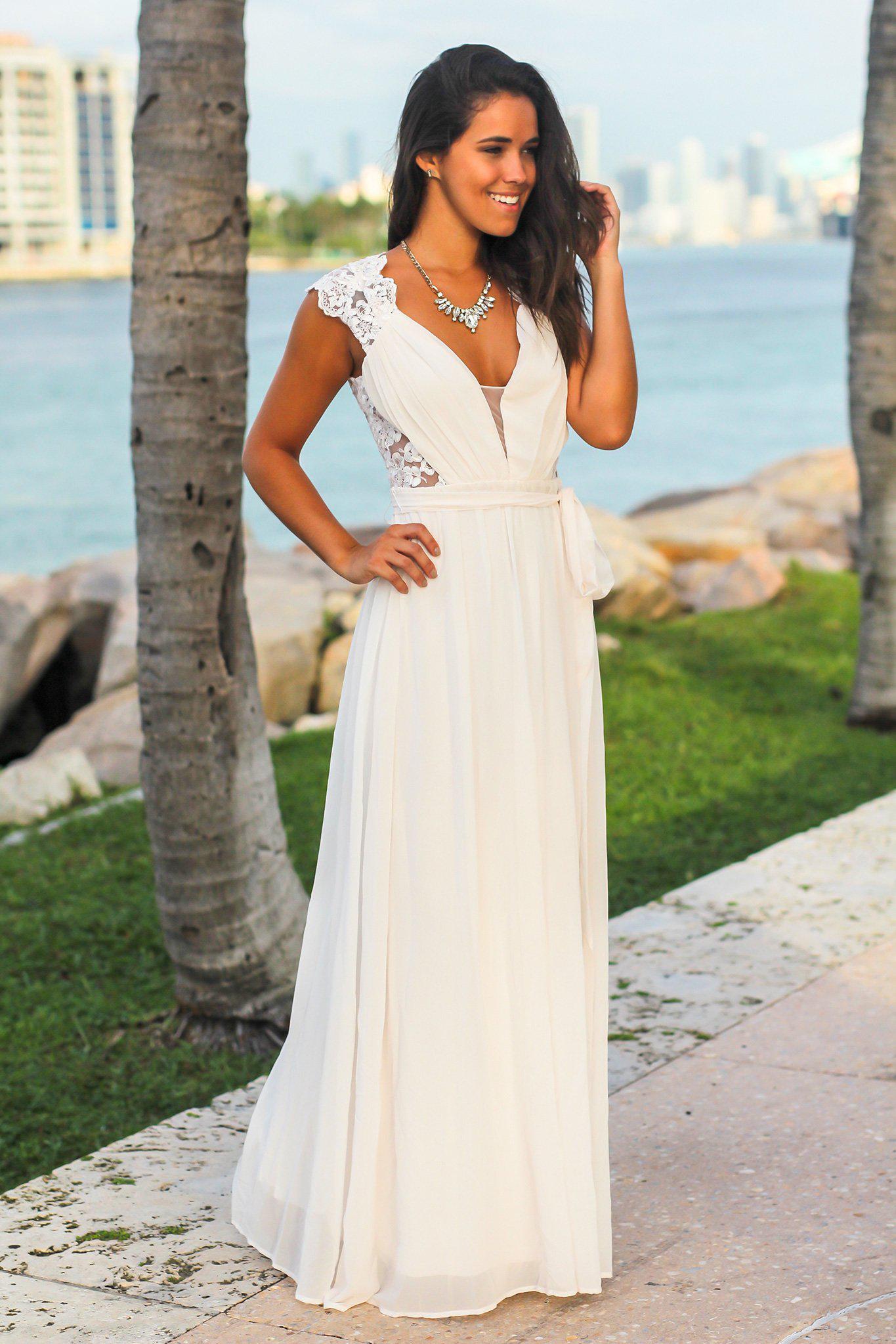 Elegant Ivory Sleeveless Maxi Dress with Embroidered Open Back
