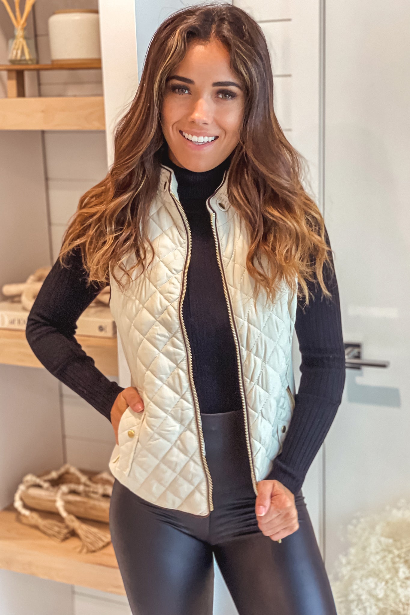 Stylish Ivory Quilted Women's Vest with Brown Trim and Zipper Pockets