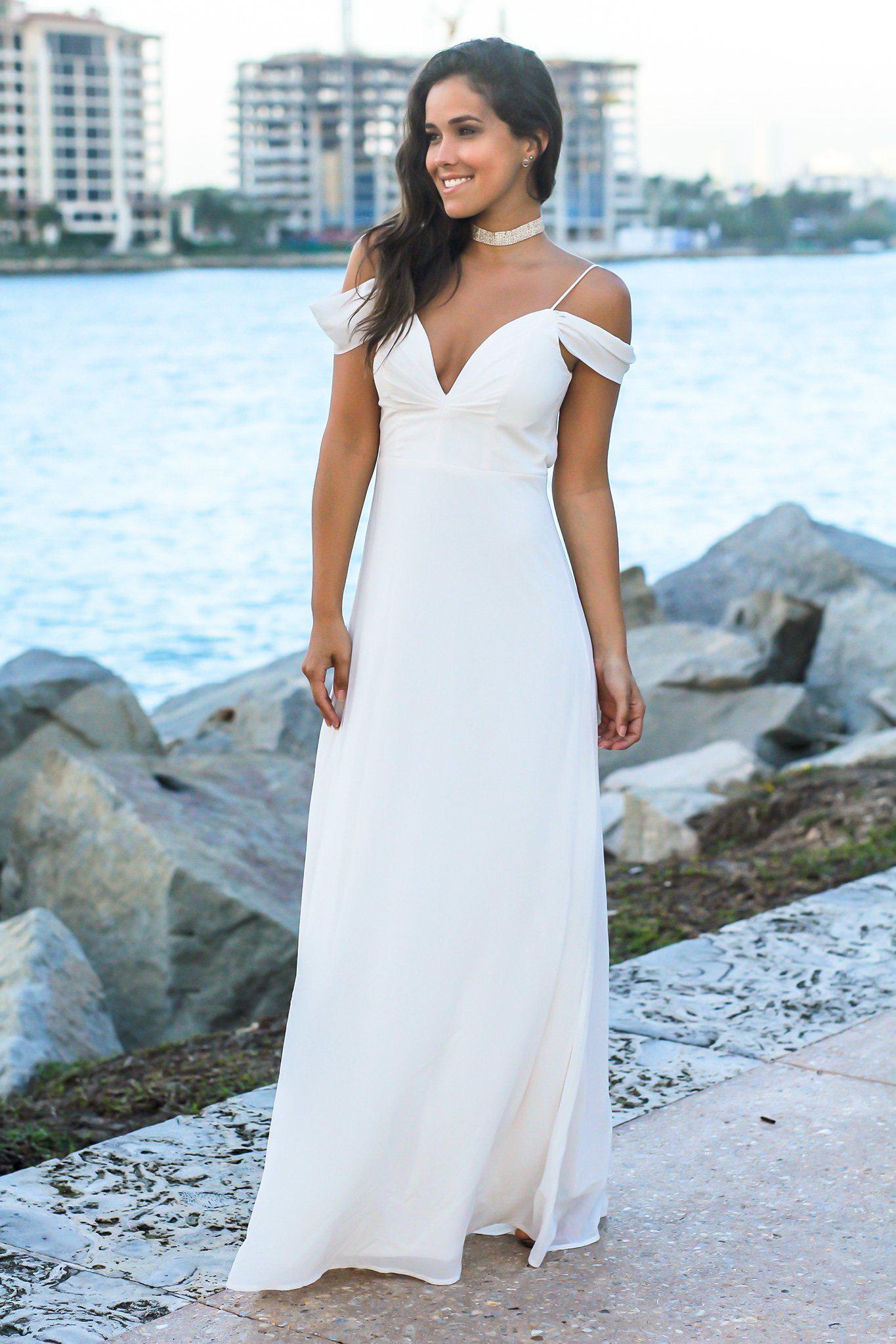 Elegant Ivory Off-Shoulder Maxi Dress with Stylish Tie-Back Design