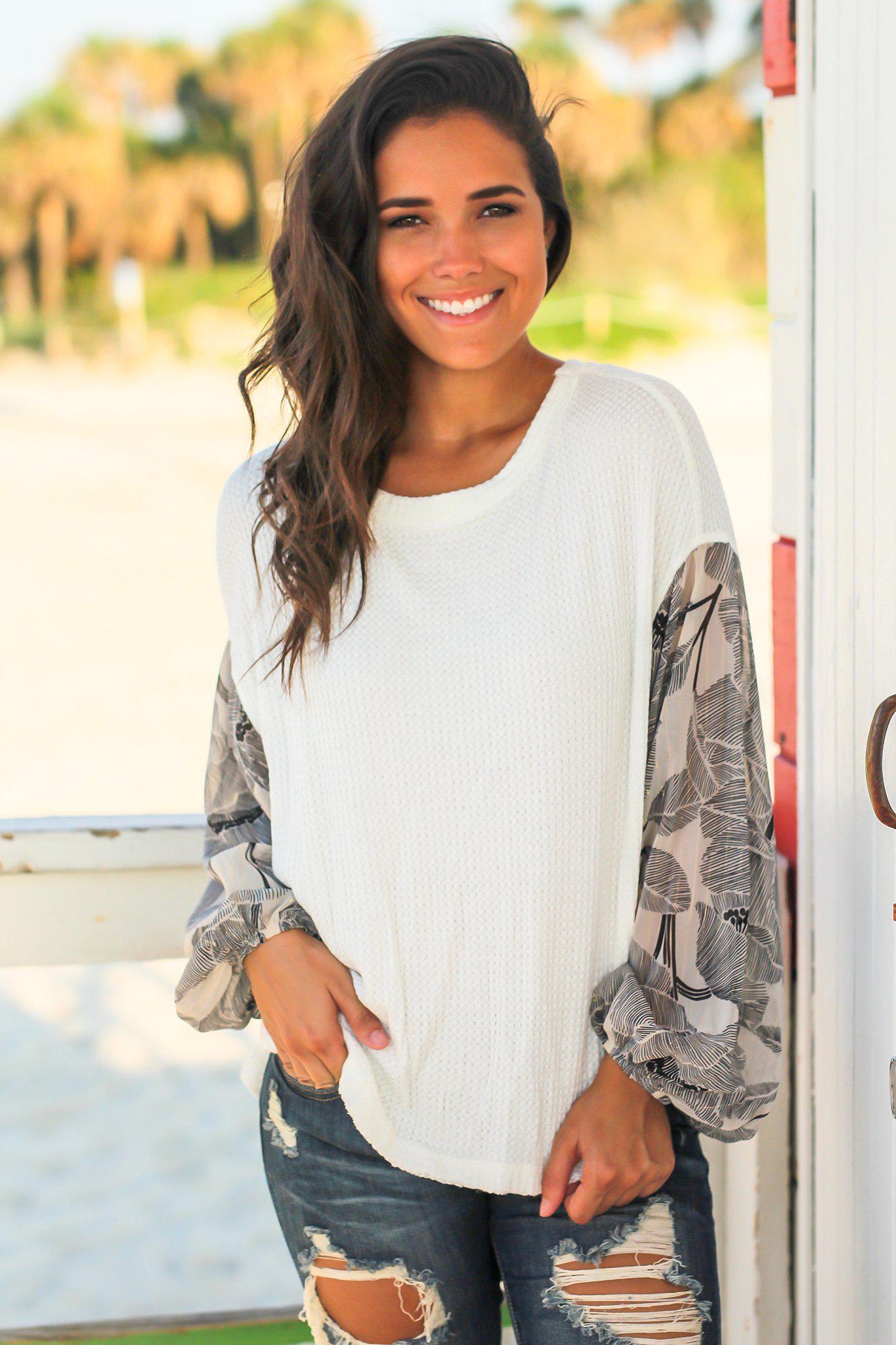Stylish Ivory Knit Women's Top with Printed Long Sleeves