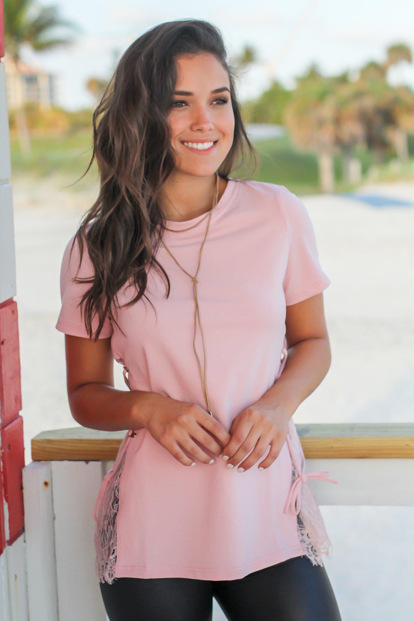 Fashionable Women's Blush Colored Top with Stylish Lace Up Sides