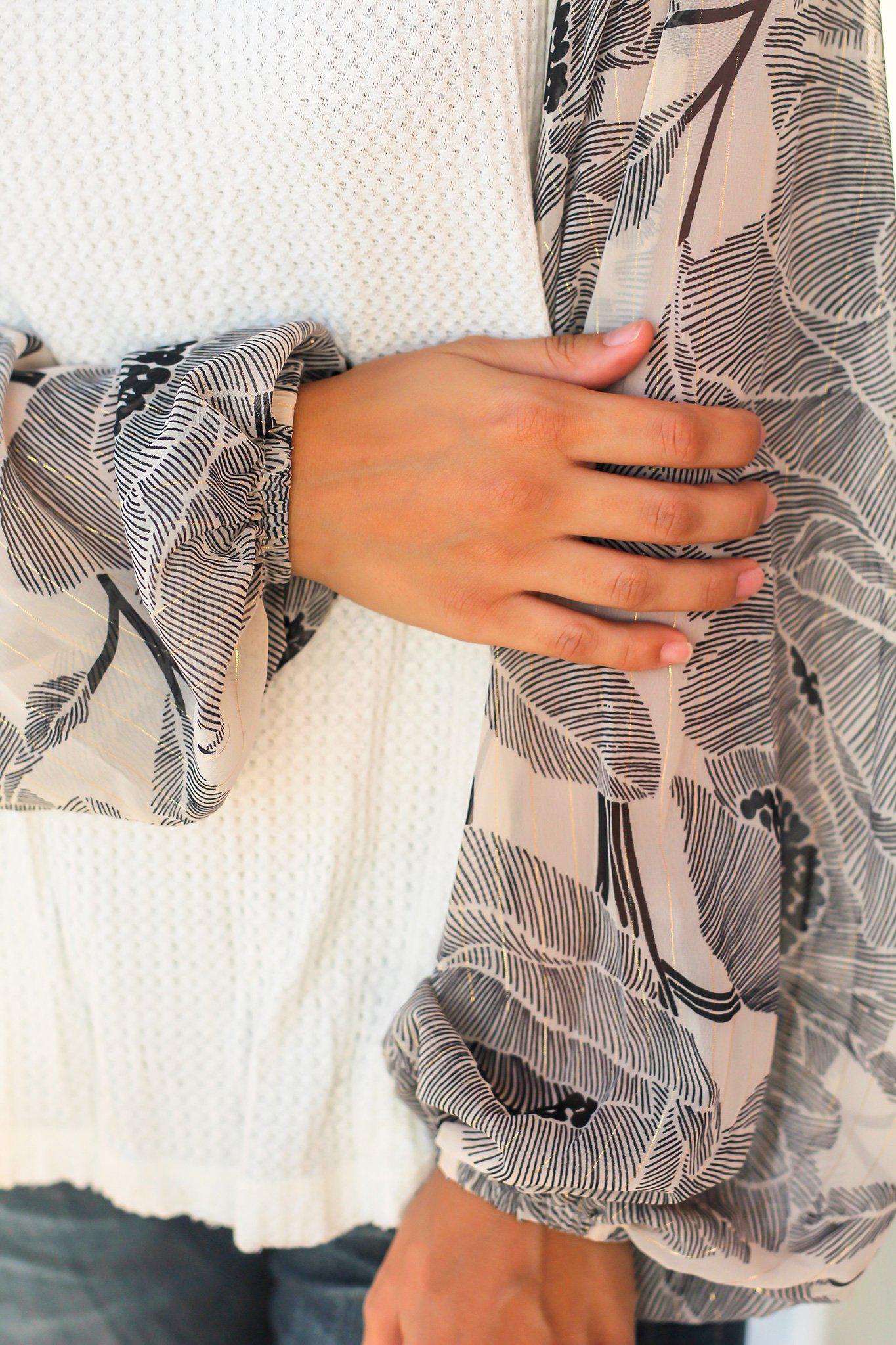 Stylish Ivory Knit Women's Top with Printed Long Sleeves