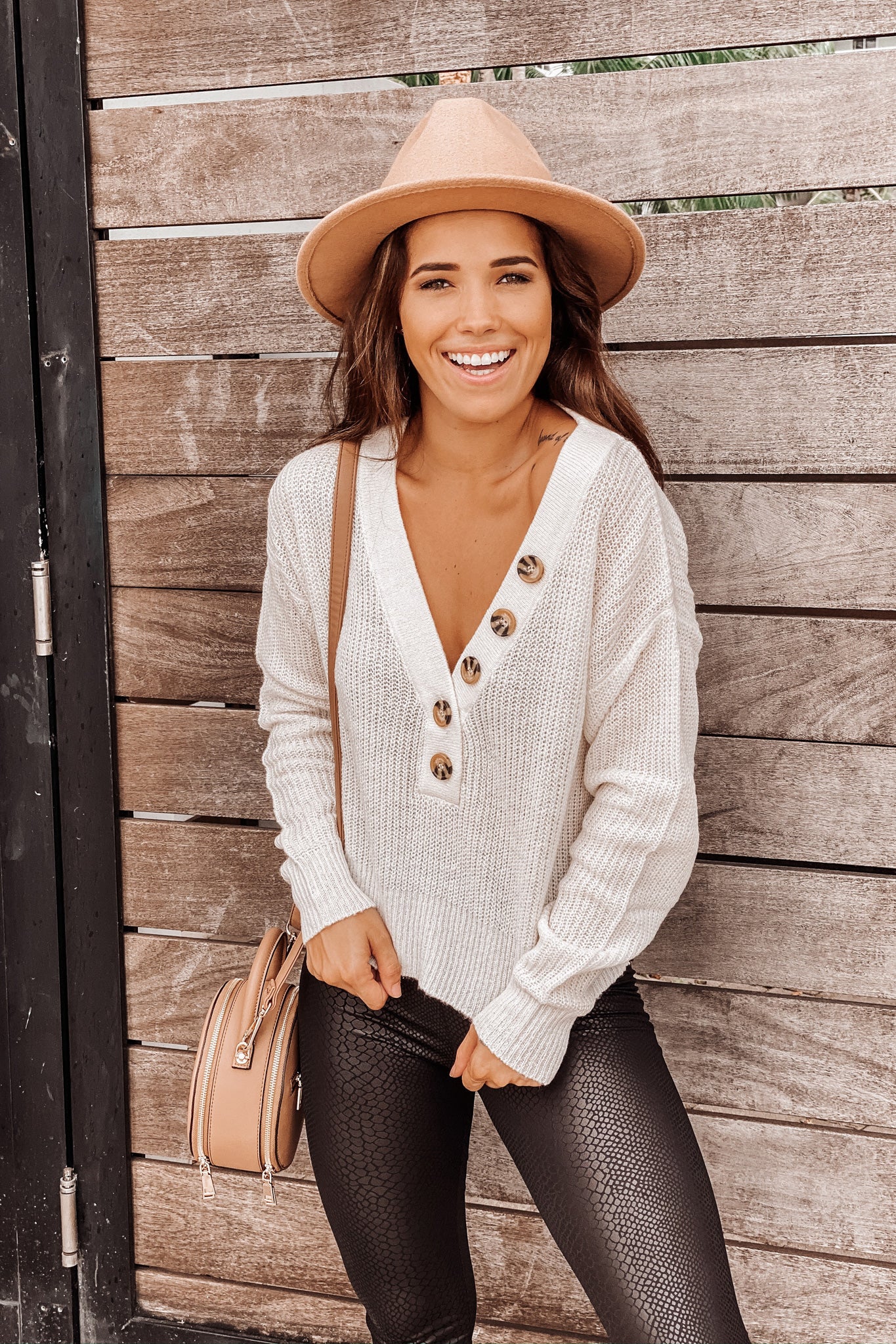 Soft Ivory Cropped Knit Sweater with Neckline Button Detail