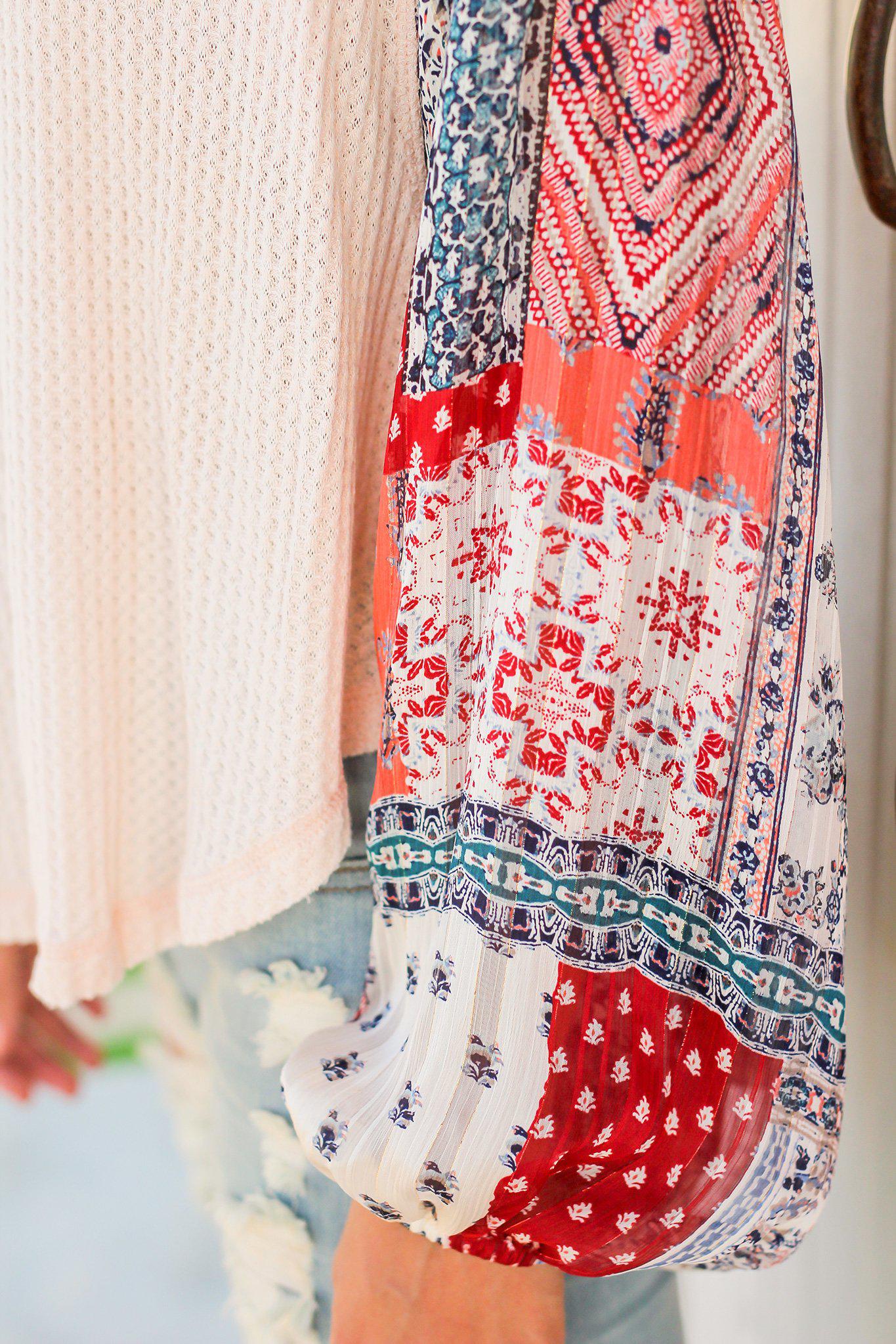 Stylish Light Peach Colored Knit Women's Top Featuring Printed Long Sleeves