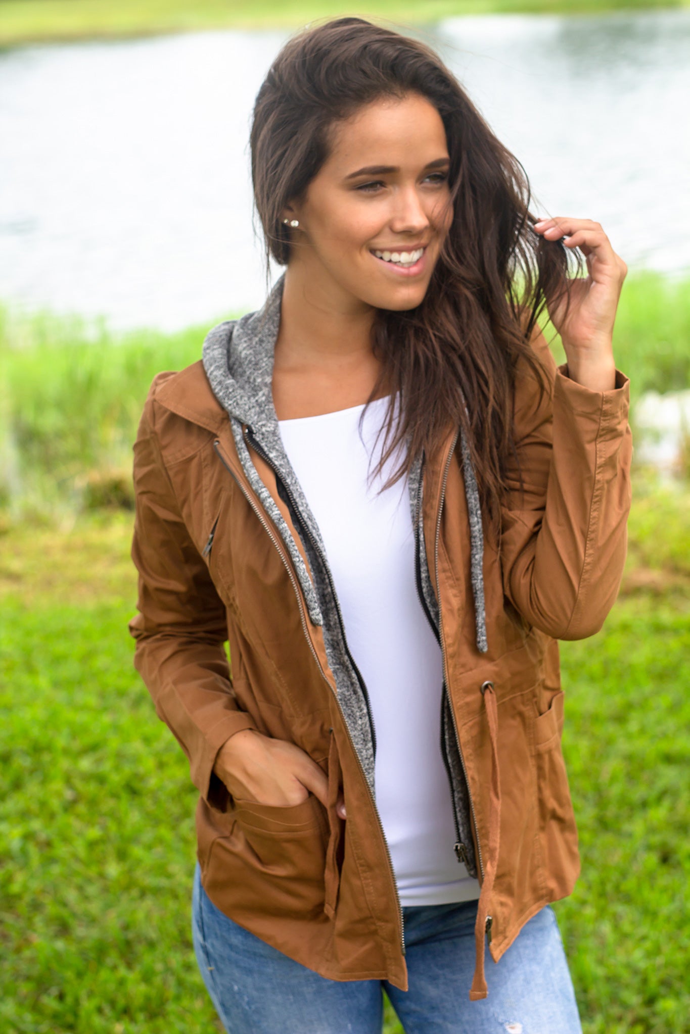 Stylish Camel Jacket with Gray Hood and Functional Pockets