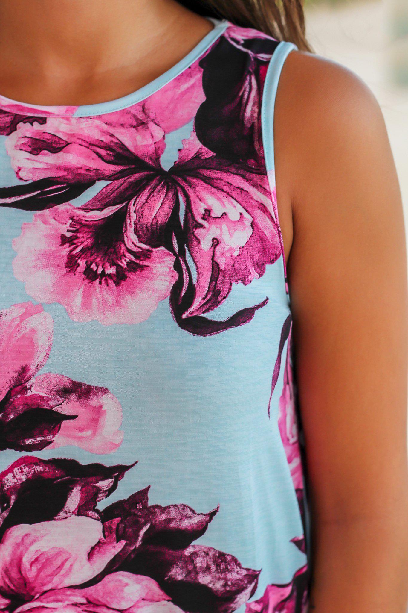 Stylish Women's Light Blue Floral Print Sleeveless Top Featuring a Ruffled Hemline