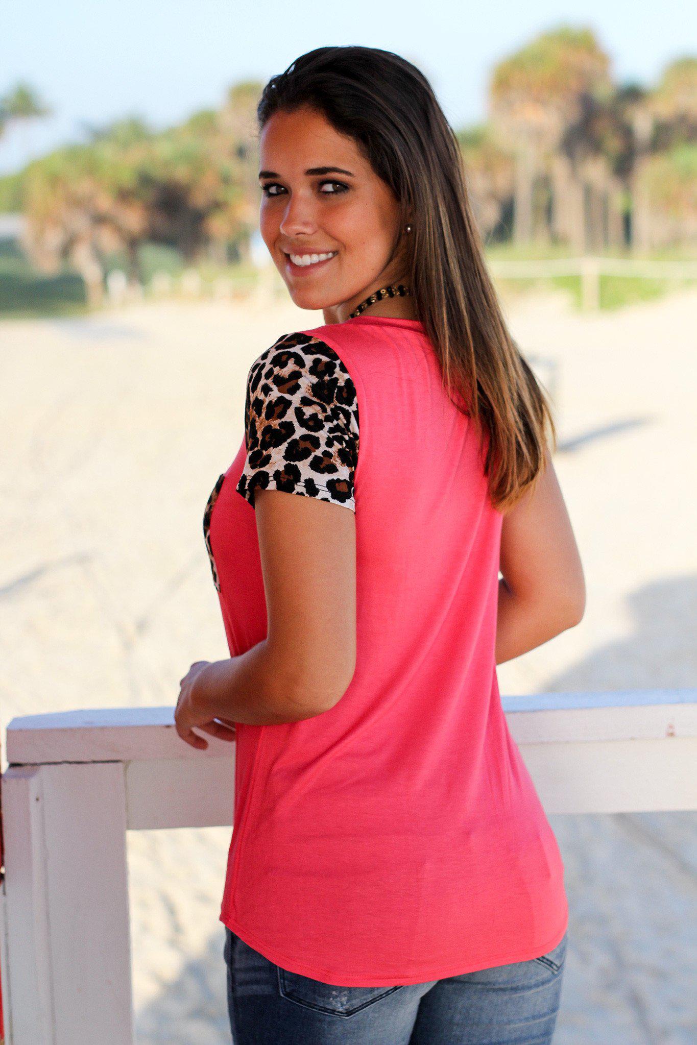 Stylish Coral Top with Leopard Print Sleeves and Pocket