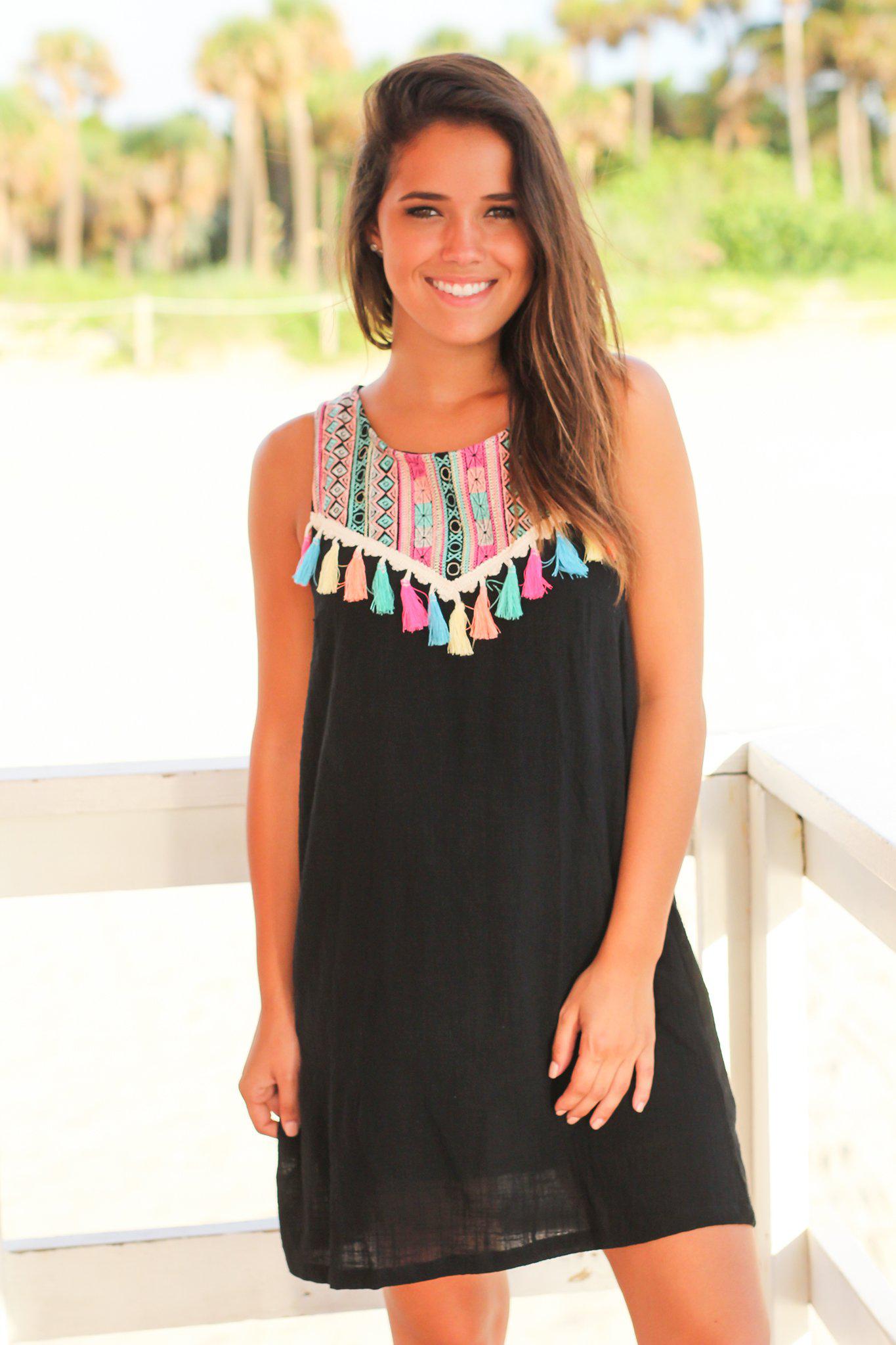 Stylish Black Short Dress Featuring Tassel Details and Colorful Prints