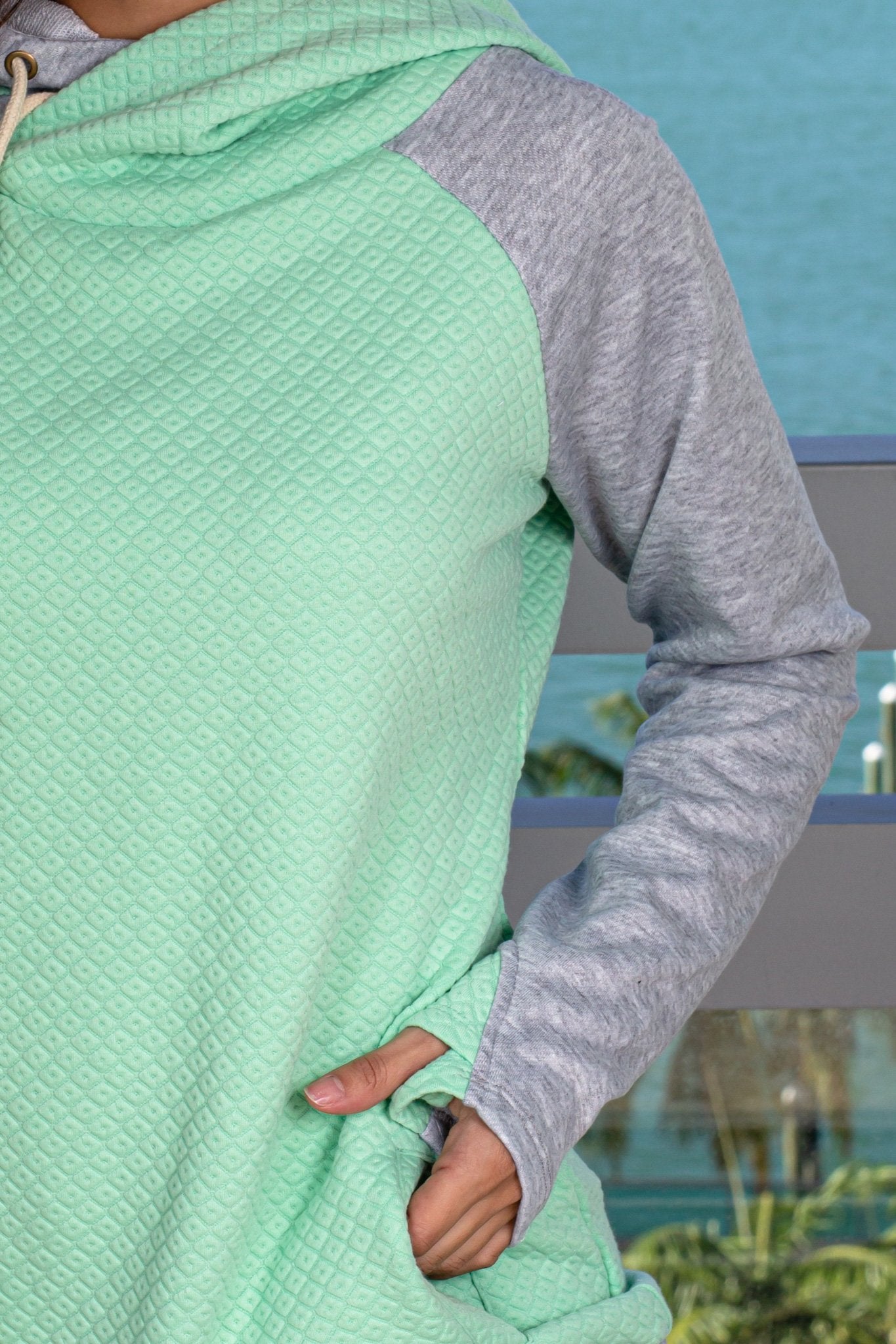 Stylish Mint and Gray Quilted Hoodie with Unique Features