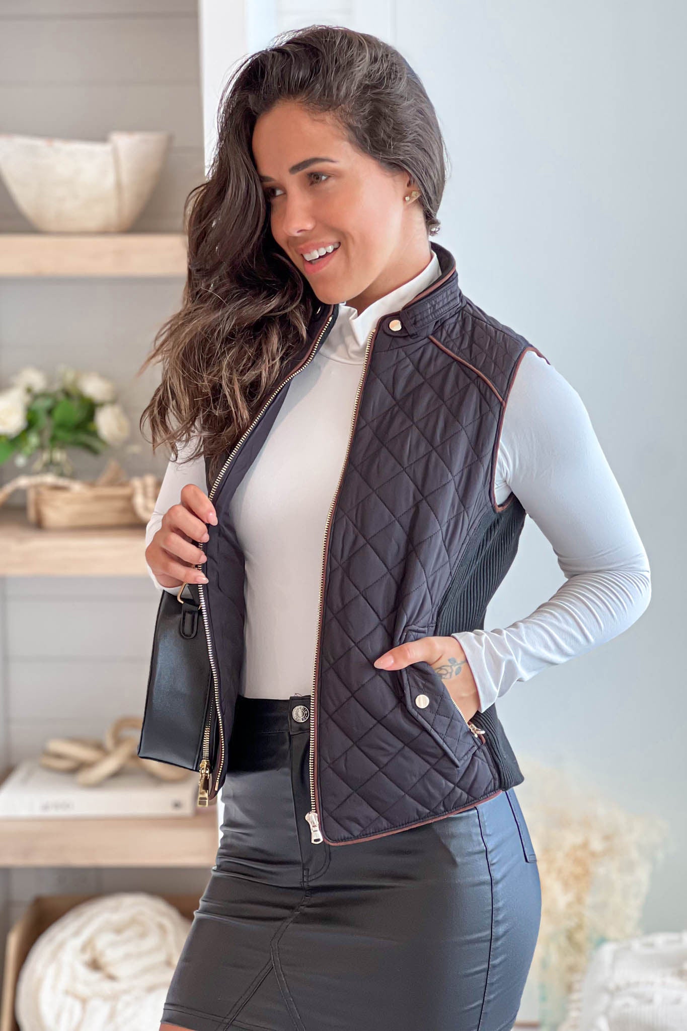 Stylish Black Quilted Women's Vest Featuring Convenient Front Pockets