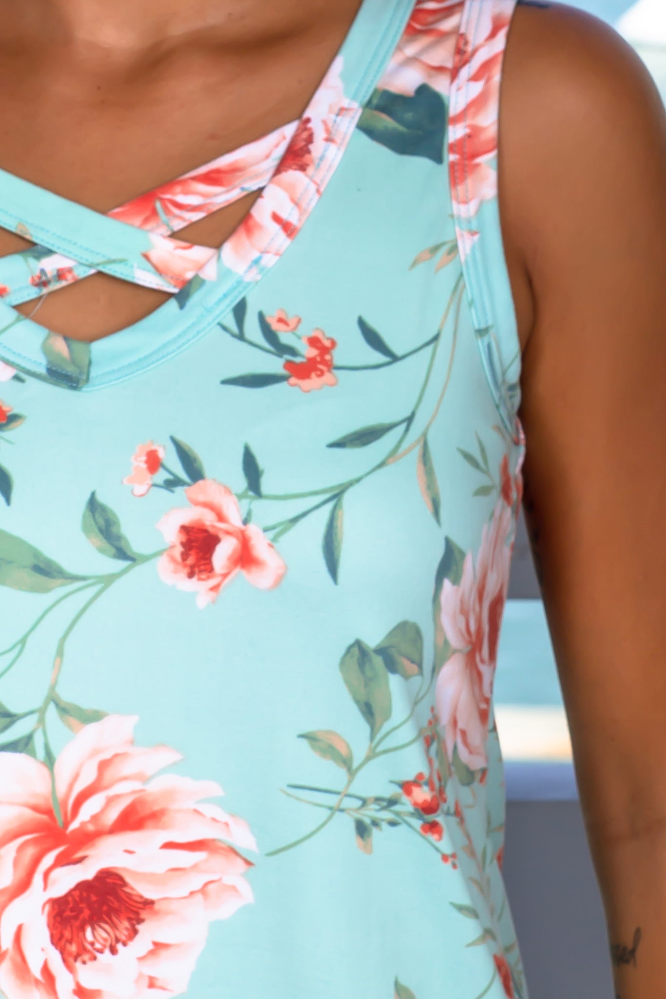 Stylish Women's Mint Floral Sleeveless Top with Criss Cross Design Detail