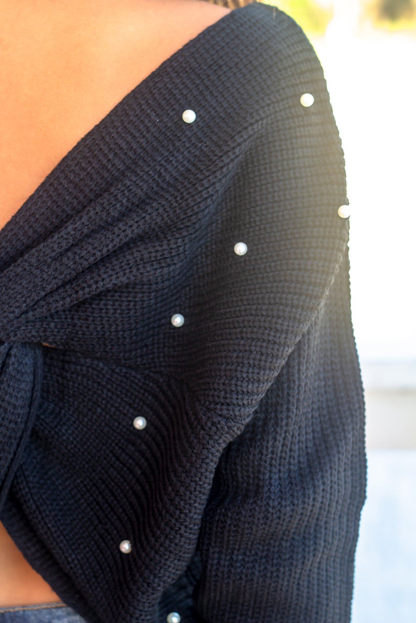 Stylish Black Polyester Knit Sweater with Back Pearl and Knot Details