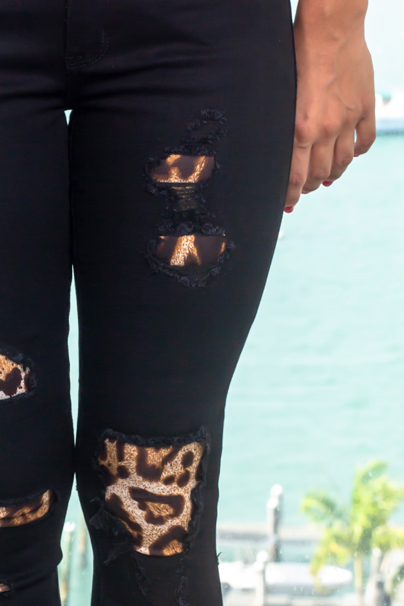 Stylish Women's Black Jeans Featuring Leopard Print Accents