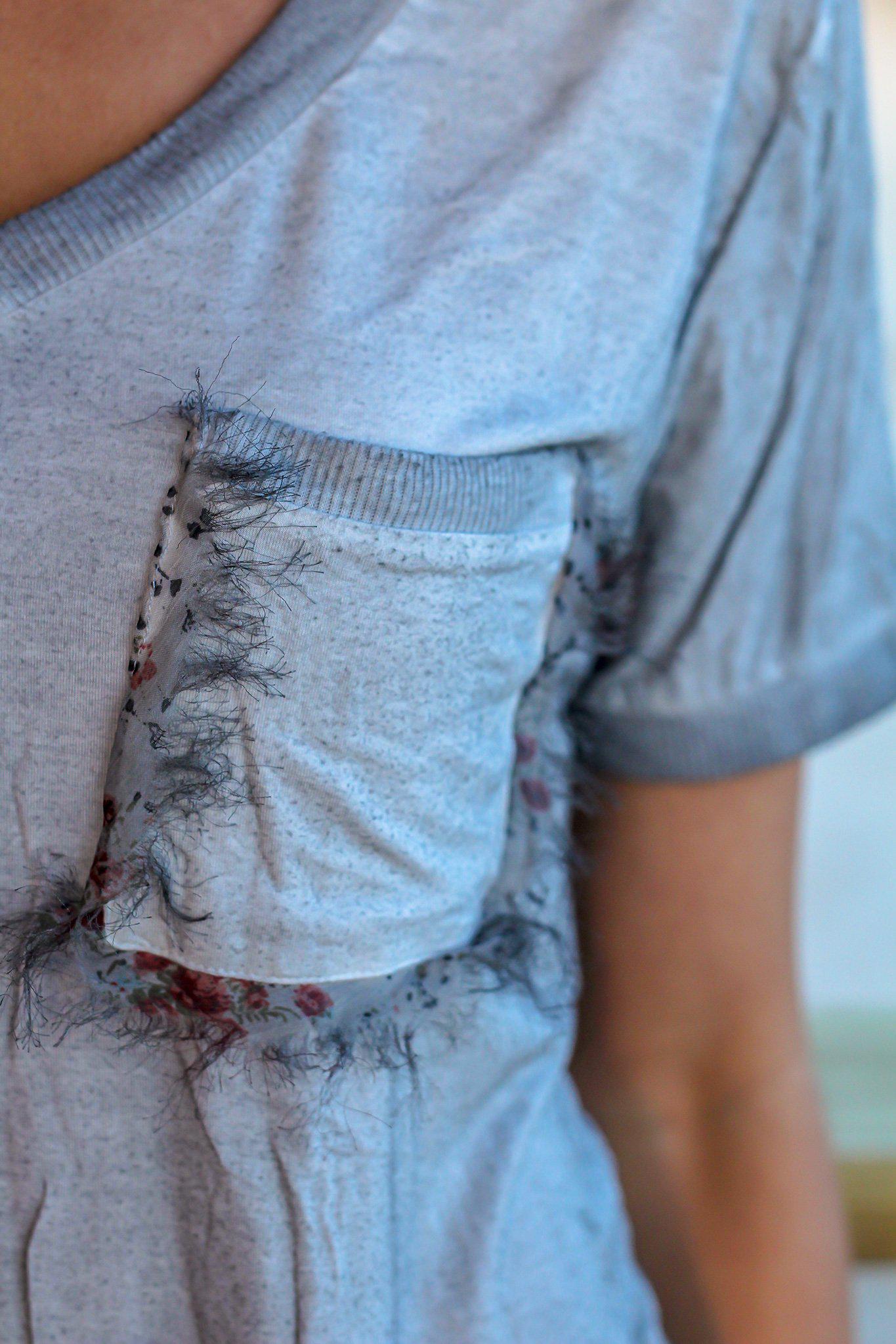 Stylish Heather Gray V-Neck Top with Frayed Floral Pocket