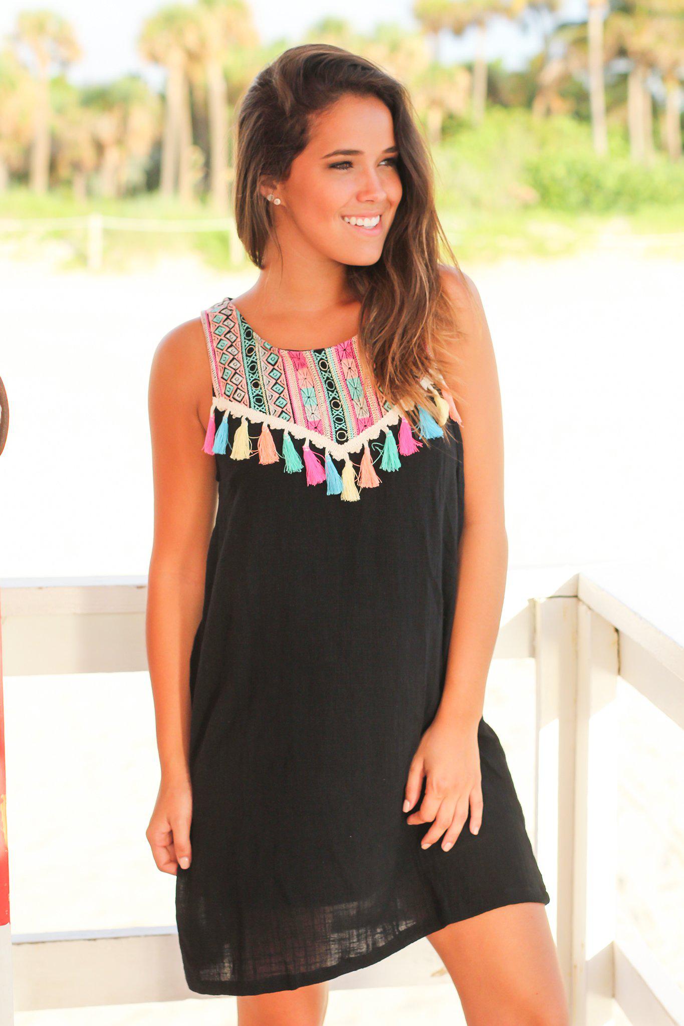 Stylish Black Short Dress Featuring Tassel Details and Colorful Prints