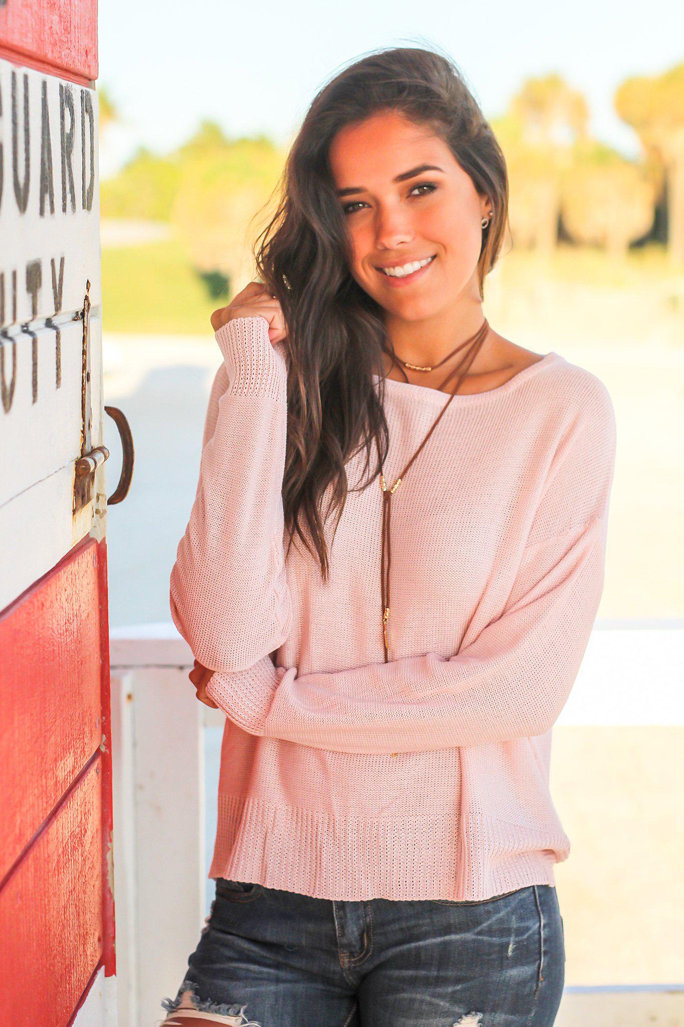 Women's Blush-Colored Knit Long-Sleeved Top with an Open Back Design