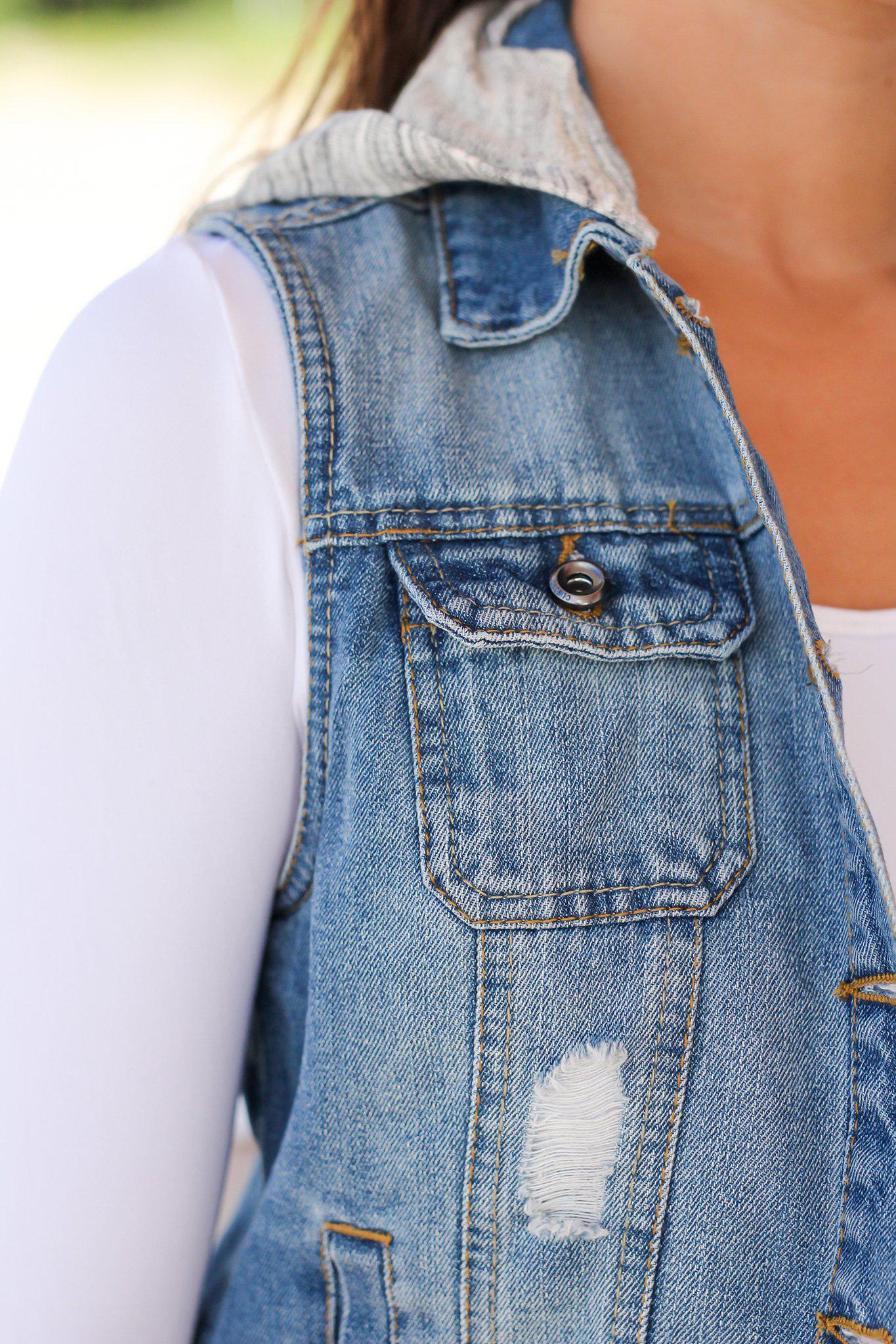 Stylish Medium Wash Denim Vest with Detachable Gray Hood for Layering