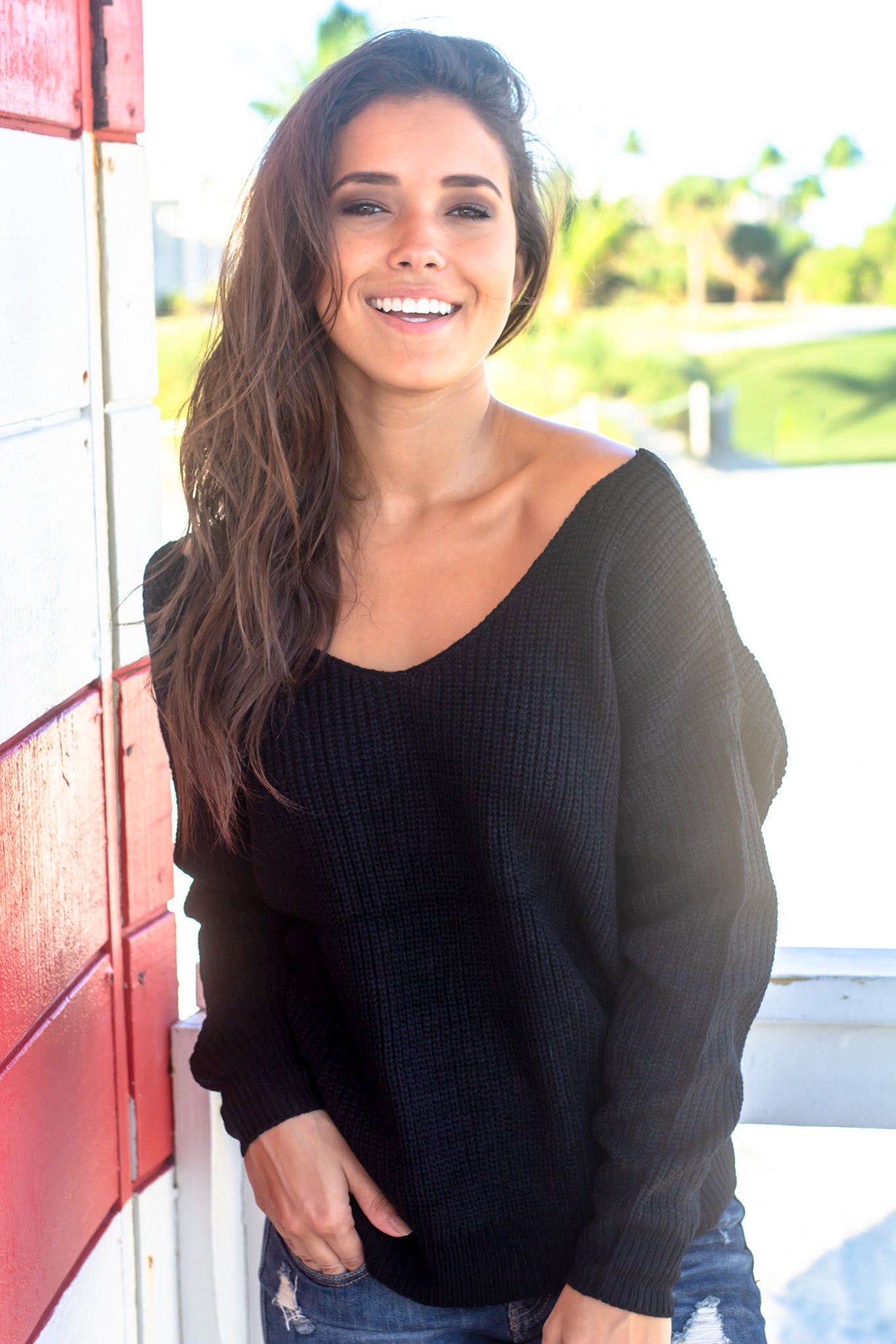 Stylish Black Polyester Knit Sweater with Back Pearl and Knot Details