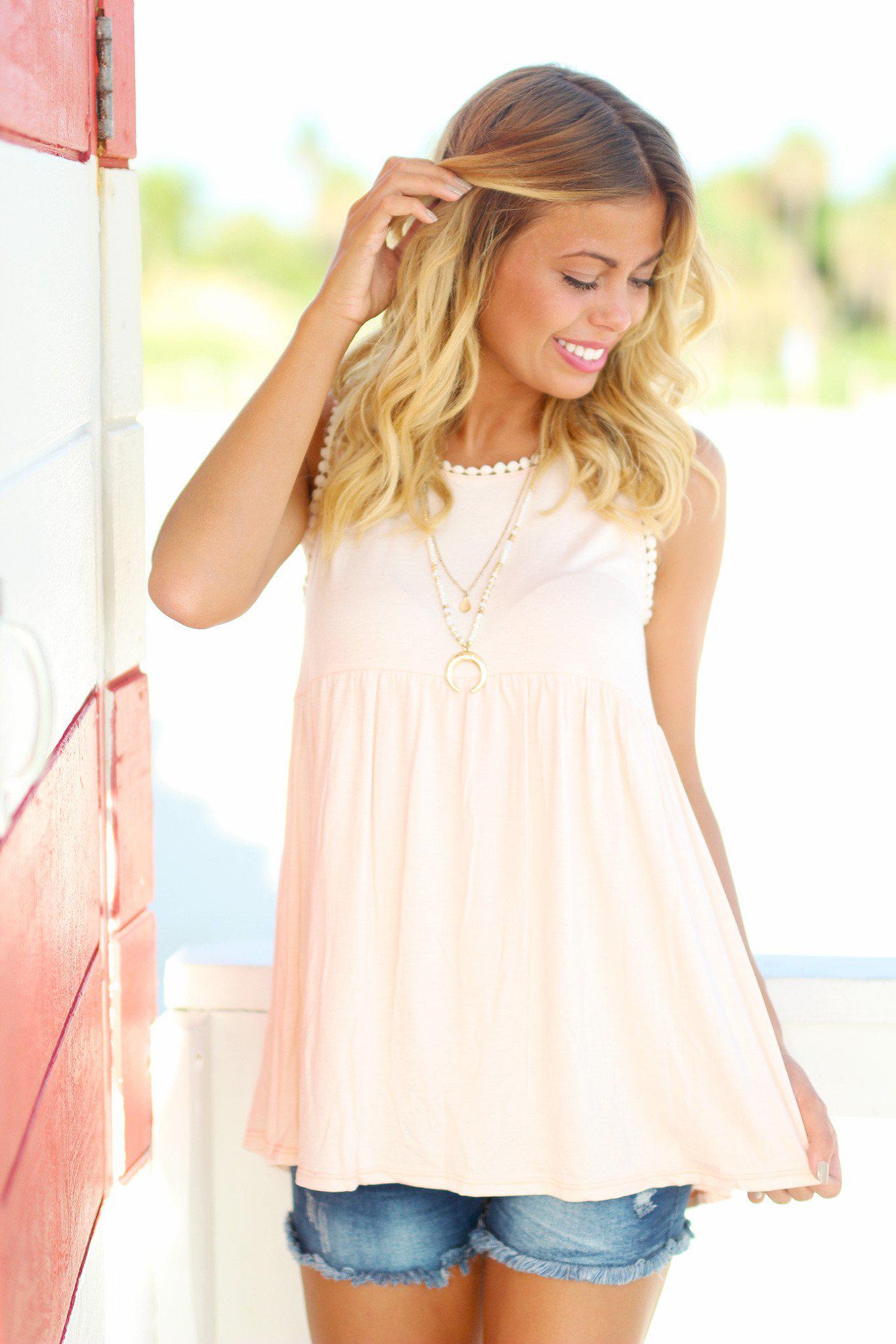 Charming Blush Rayon-Spandex Baby Doll Top for a Flattering Look